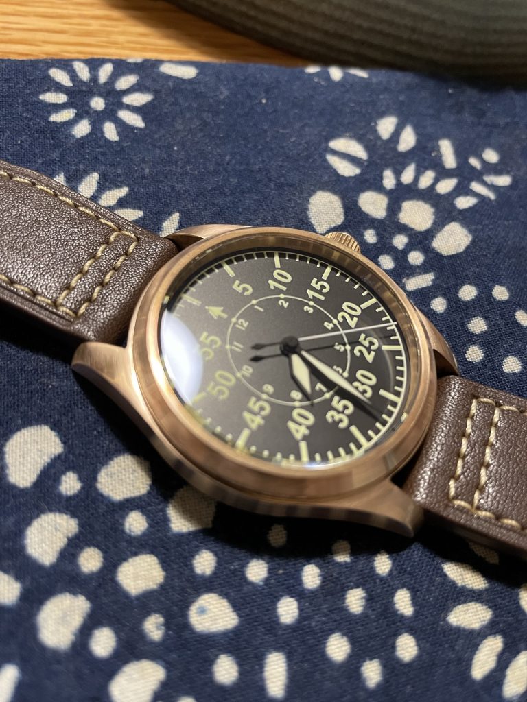 San Martin Bronze Watch Under Light